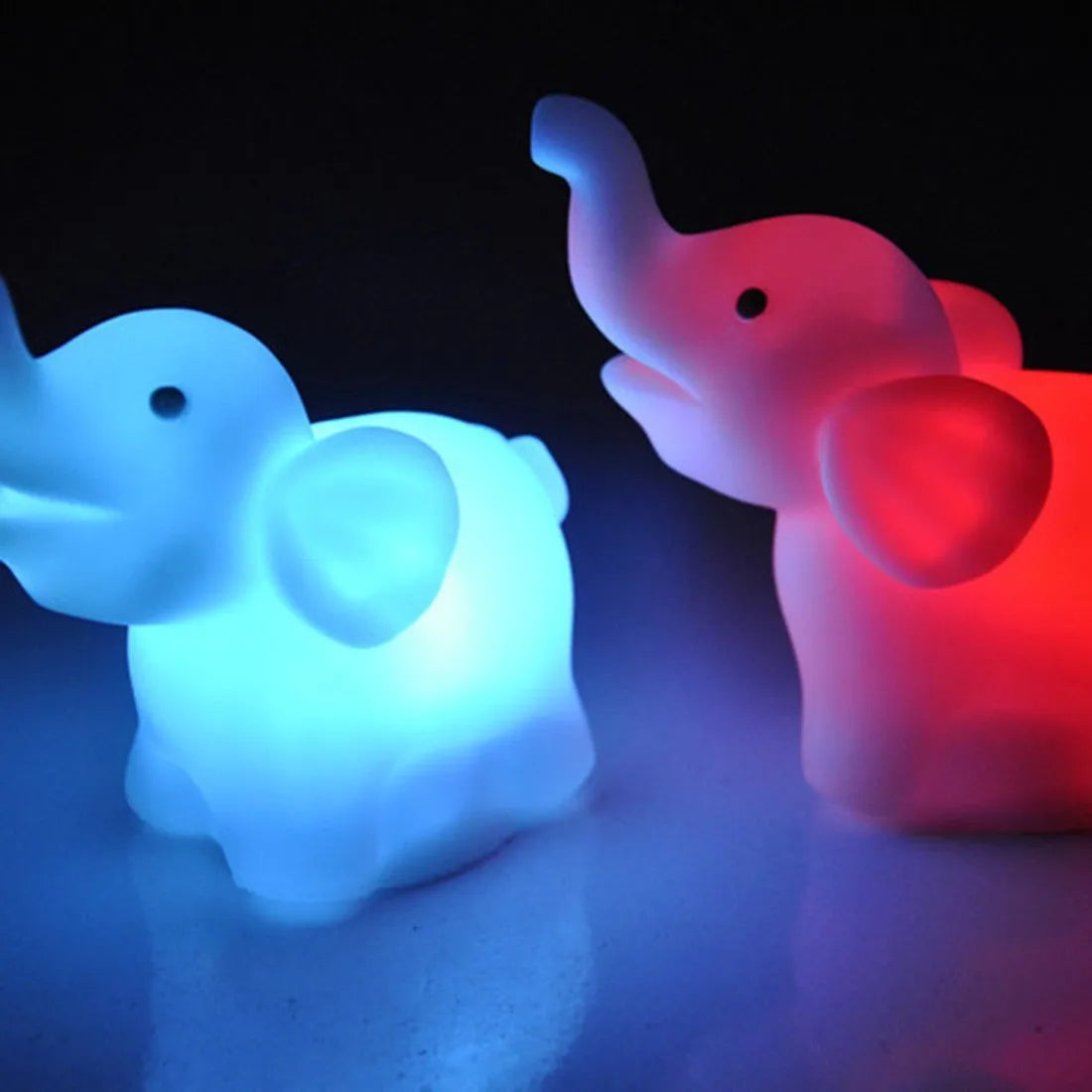 Elephant night light showing 7 colour changing modes with slow flash, vinyl body, 8x8.8x4.5cm size, battery powered
