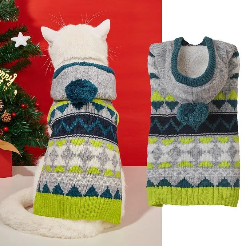 Green diamond pattern knit sweater on a small dog, showing classic design and soft acrylic fabric.