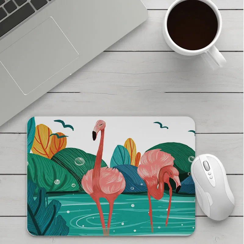 Custom cartoon mouse pad with thickening, showing example artwork on non-slip rubber and cloth base.