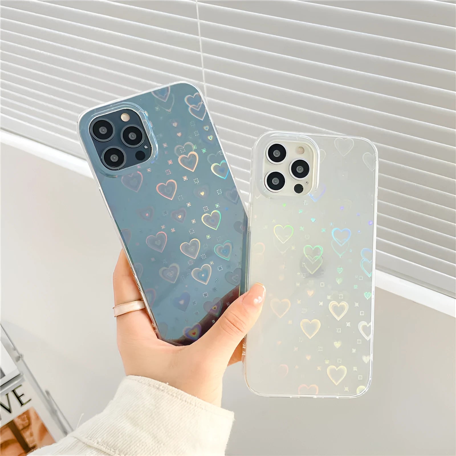 Transparent silicone iPhone case with laser butterfly pattern showing phone compatibility