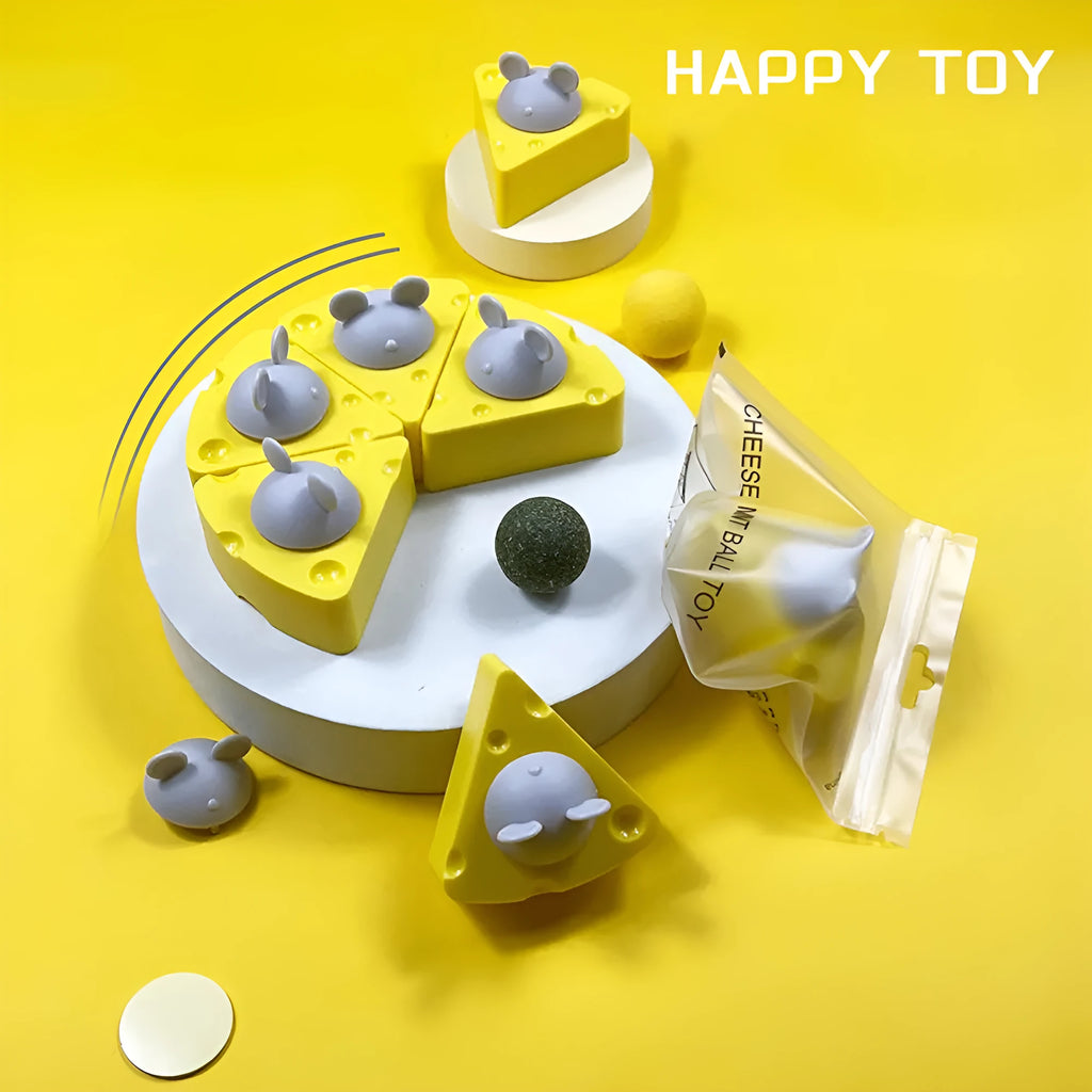 Yellow catnip and silvervine chew toy balls for cats with wall-mounting feature