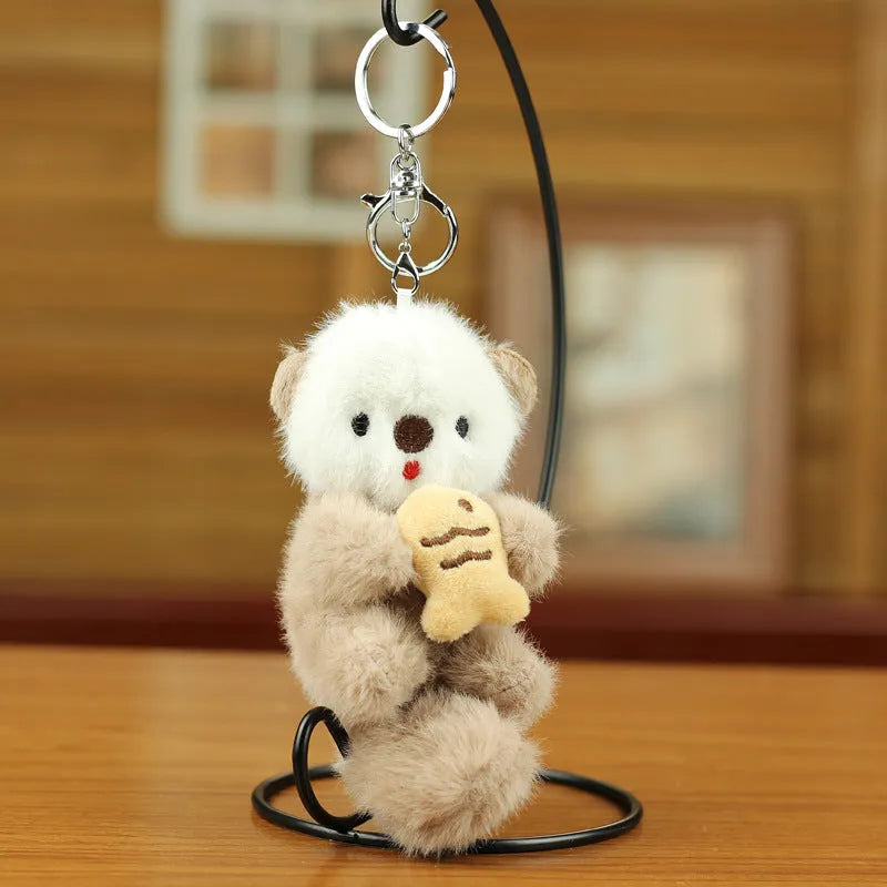 Cute sea otter pendant plush toy keychain with dark brown, light brown, and gray options
