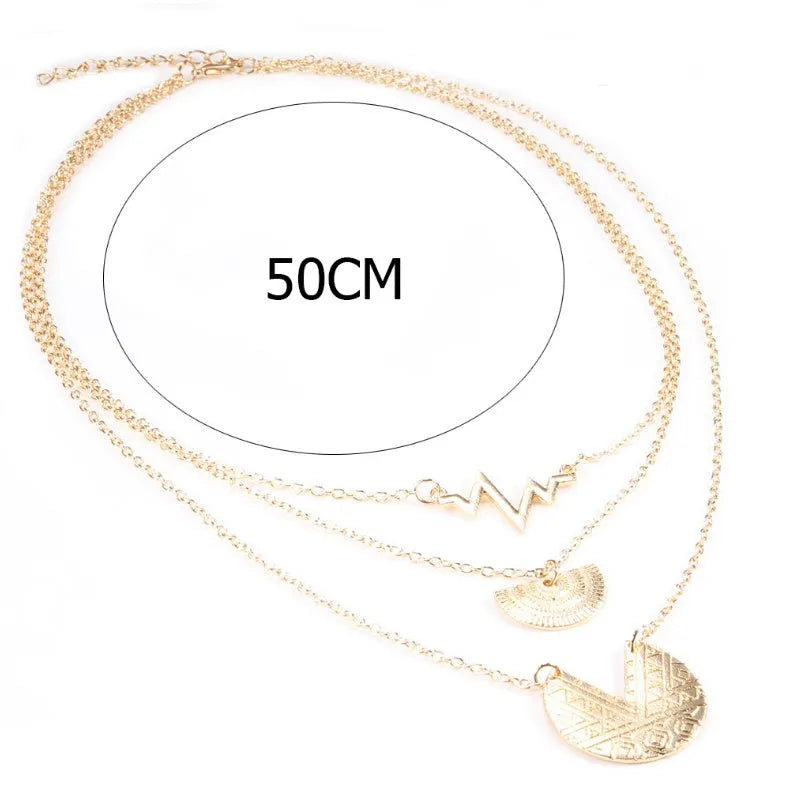 Gold multi-layer round alloy necklace with electroplated finish on white background