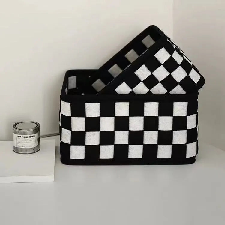 Checkerboard pattern woven felt folding storage box measuring 37cm by 29cm by 19.5cm