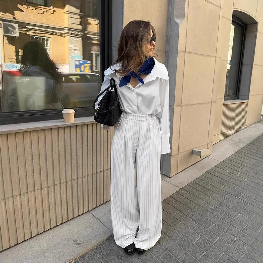 White striped loose fit wide-leg commuter trousers with zip fastening