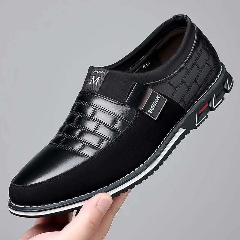 Slip-on men's plus size casual leather shoes in black with round toe and rubber sole