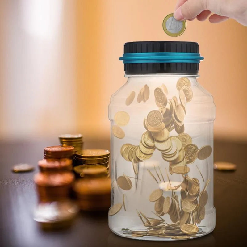 Transparent digital coin counting money box with LCD screen on black lid, 11.5cm by 20cm