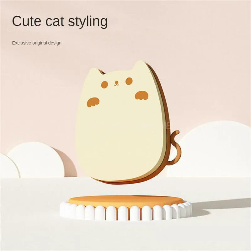 Blue silicone sponge pet grooming brush with two types of comb teeth on a white background.
