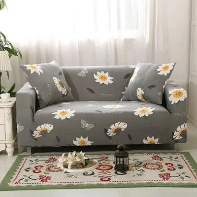 Geometric patterned stretch sofa slipcover fitted on a modern two-seater sofa.