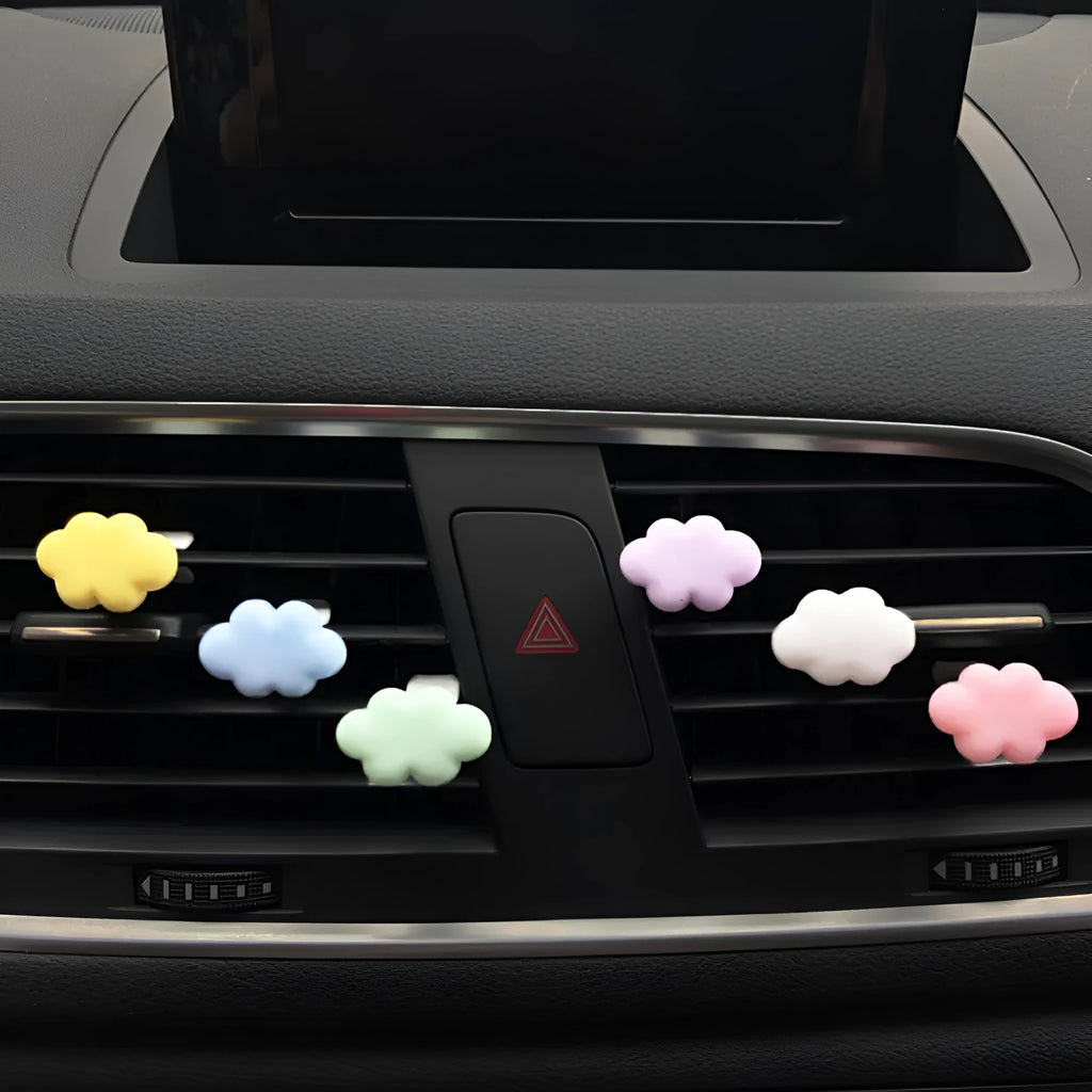 Resin car air vent fragrance clip in cartoon design, 17mm by 27mm, shown in one of six colours.
