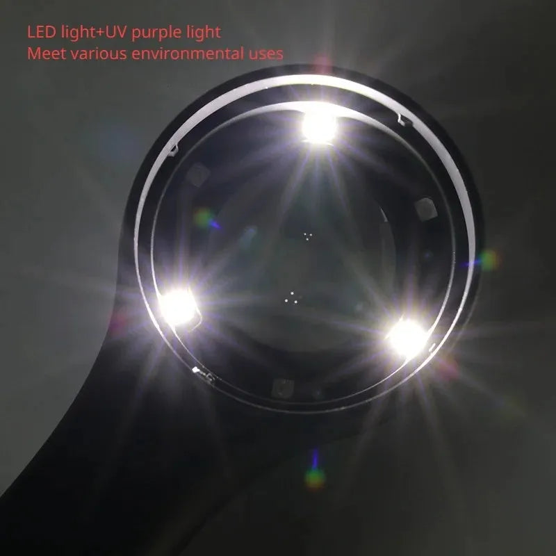 A black or silver appraisal magnifying glass with an optical glass lens and a USB-C charging cable.