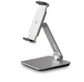 Folding aluminium desktop phone and tablet stand with 360-degree rotation on a wooden desk.