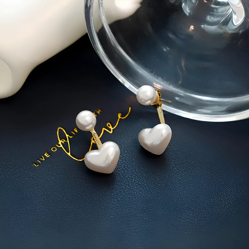 Women's heart-shaped pearl stud earrings with Korean style design and alloy electroplated finish