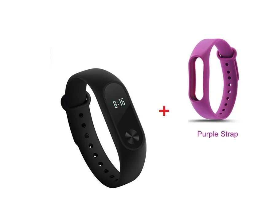 Xiaomi Mi Band 2 black fitness tracker on wrist showing OLED display