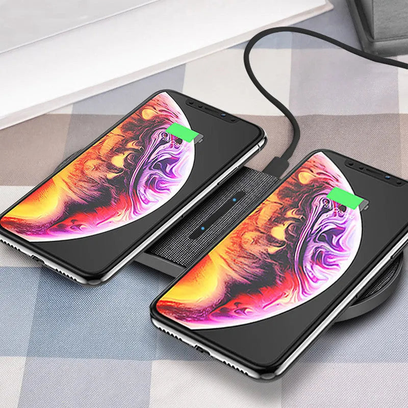 Black dual-pad 10W wireless fast charger for mobile phones with LED lights.