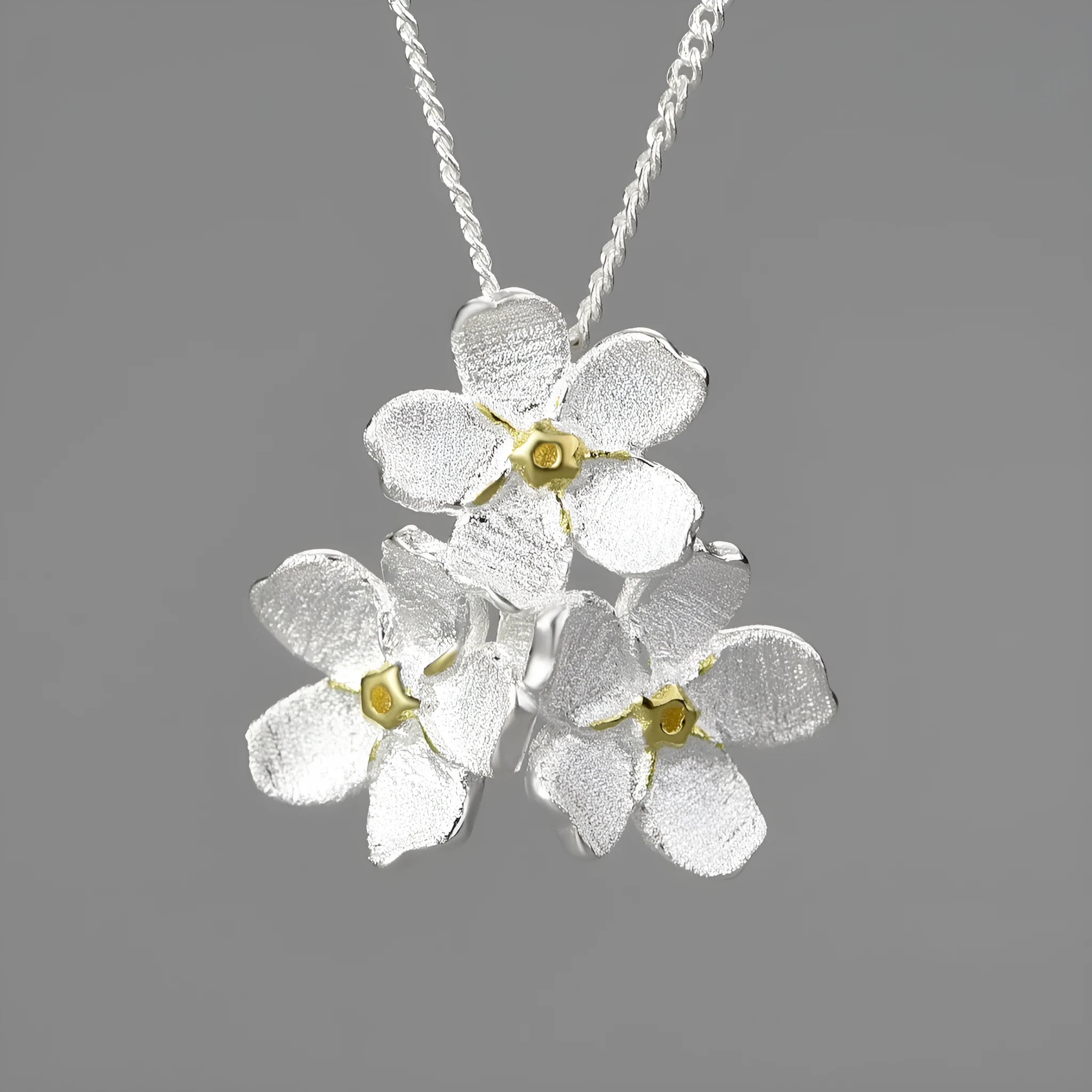 Myosotis Sylvatica sterling silver floral pendant with pastoral style design