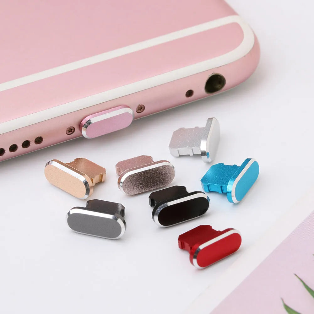 Aluminium alloy charging port dust plug for iPhone in various colours including gold, silver, and rose gold.
