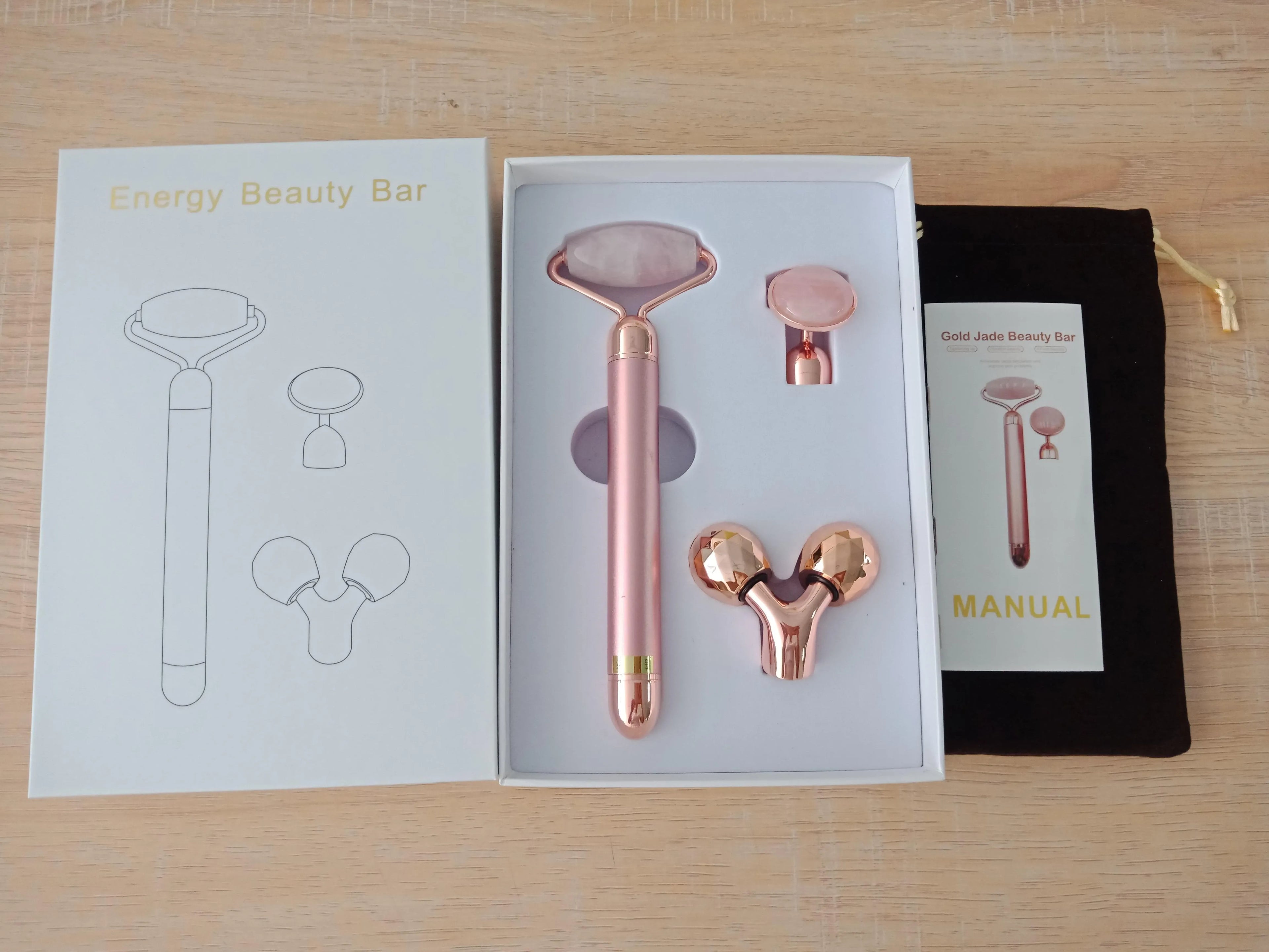 3-in-1 vibrating facial jade roller set with rose quartz heads in rose gold colour