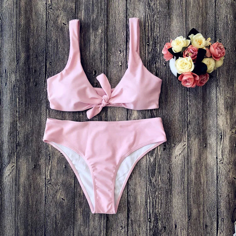 Solid colour bikini set in polyester fabric on a white background.