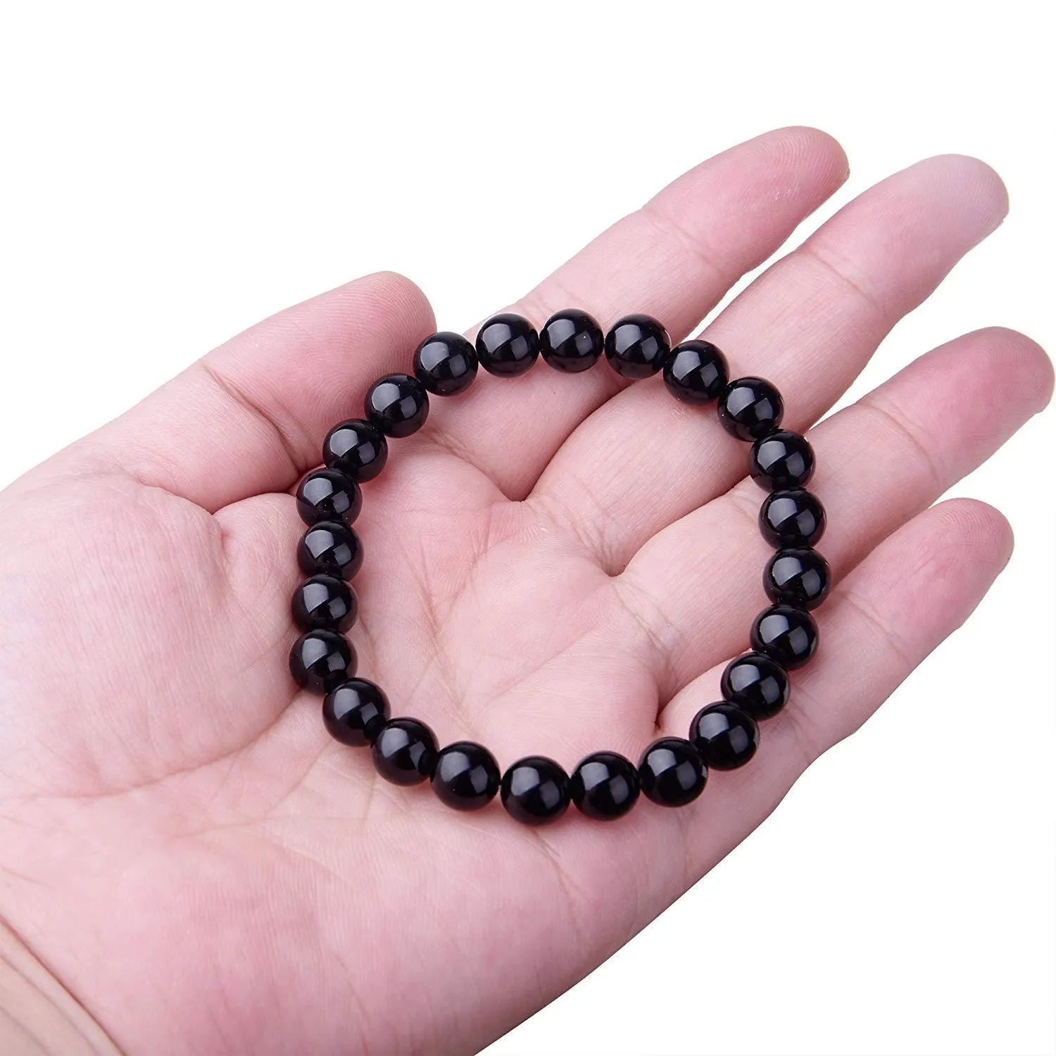 Geometric black agate bead bracelet for women with 8mm stones on a stretch elastic cord.