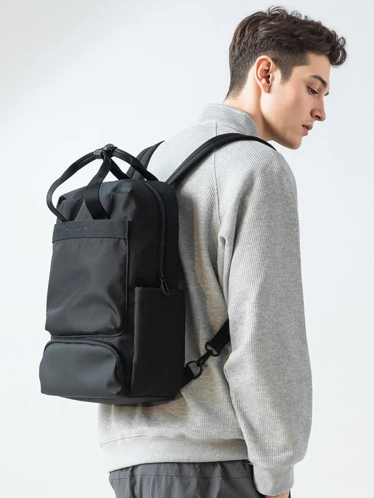 Elegant black Oxford cloth computer backpack with 20-35L capacity shown front view