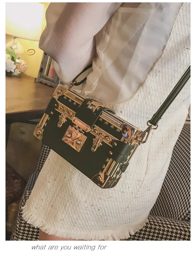 Women's black PU leather hard flap shoulder bag with decorative rivets and hasp closure