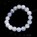 Natural blue moonstone bracelet with polished round beads showing sizing from 5mm to 12mm diameter