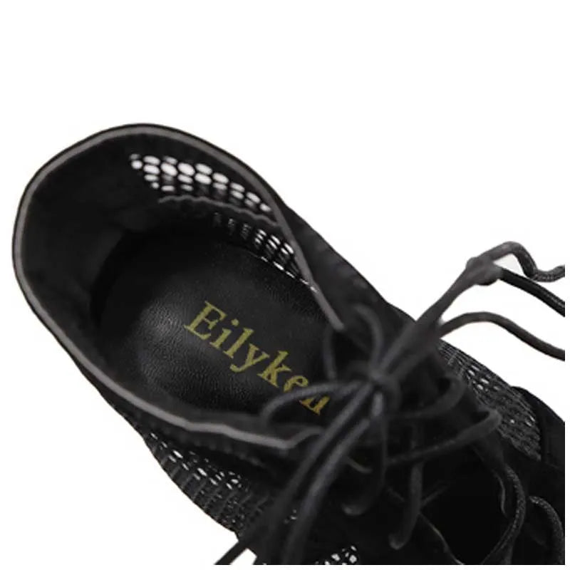 Black suede women's lace-up high heel shoes with an 11.5cm heel on a white background