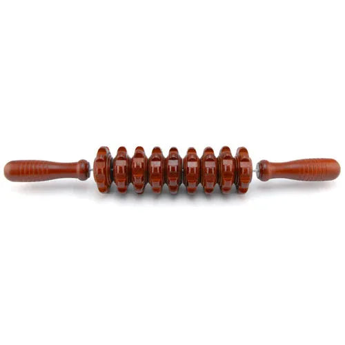 Wooden massage roller 38cm placed on surface, used for back and leg muscle trigger point recovery