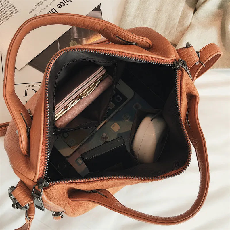 Soft PU leather women's tote shoulder bag showing large capacity and zipper closure