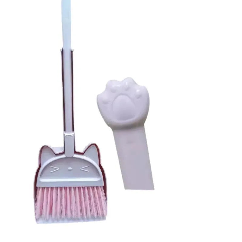 Purple, green, and beige plastic broom and dustpan set with rotating holder.