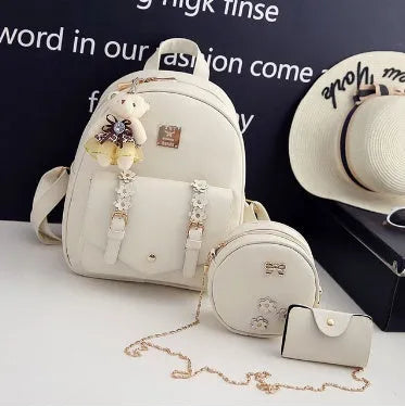 Women's fashion 3-piece bag set including backpack, shoulder bag, and card bag in floral PU leather design