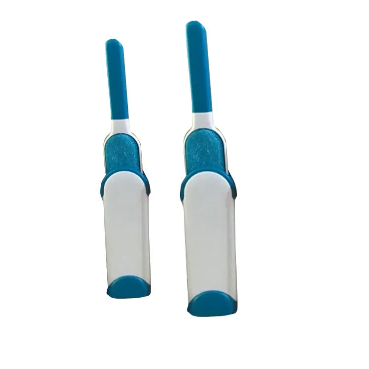 Blue reusable pet hair removal brush with a self-cleaning base, placed on a grey sofa.