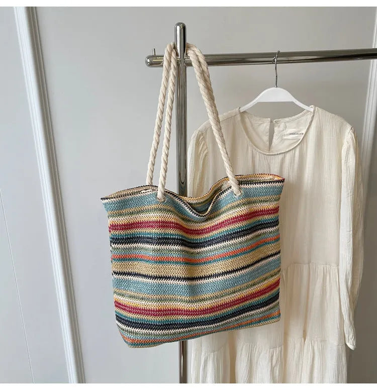 Blue straw woven large capacity single-shoulder bag with nylon construction.