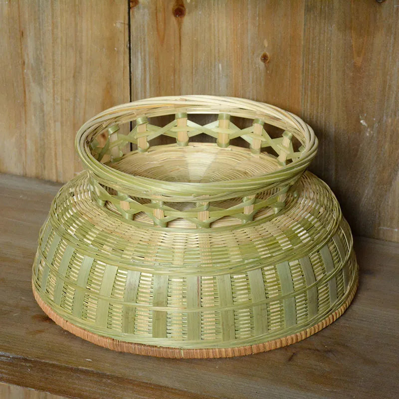 Handmade bamboo storage basket in woven construction showing three size options