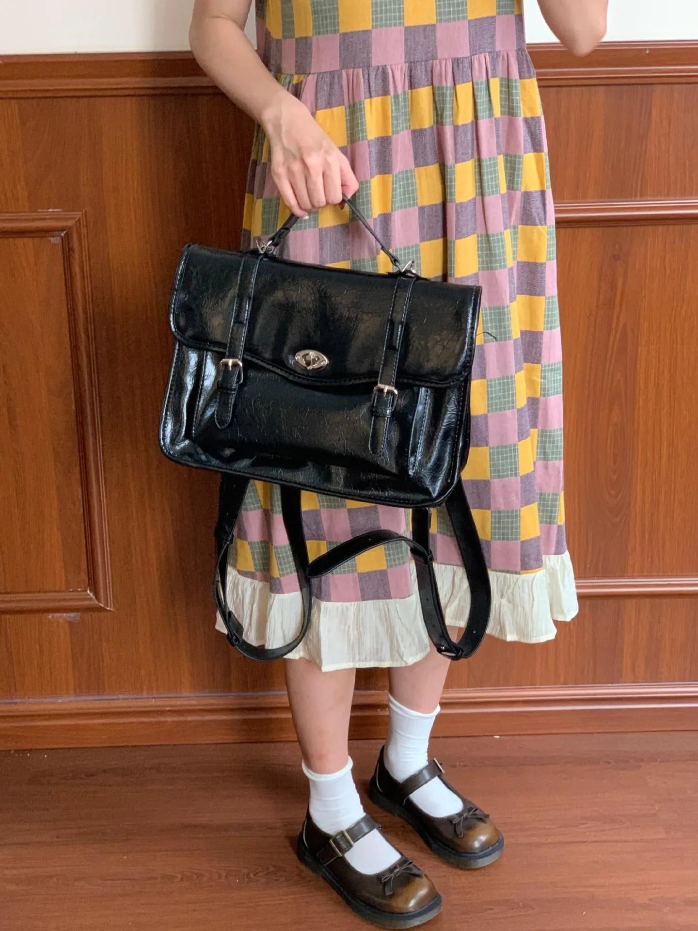 Black college messenger bag for women with oil wax leather look, 35cm length