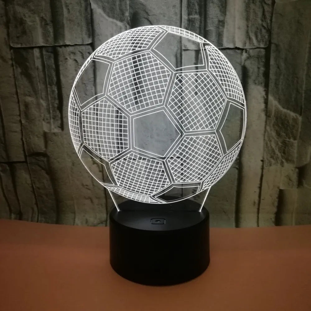 Football-shaped 3D night light with colour-changing acrylic panel on ABS base