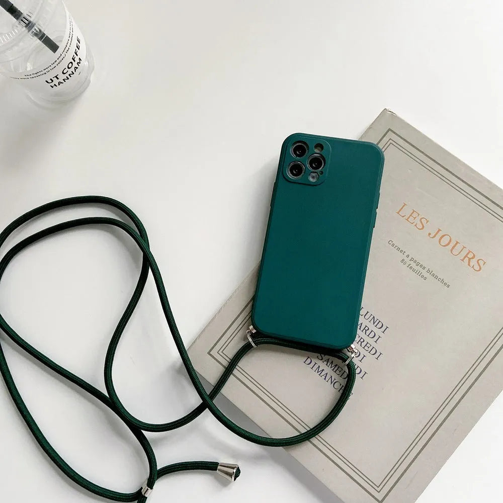 Liquid silicone phone case with crossbody lanyard for iPhone 13 Pro in black, showing rear cover and attached strap
