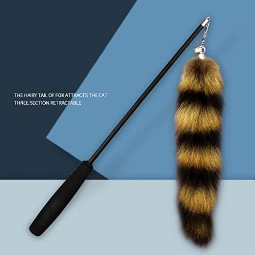 Black cat toy wand with feather teaser on elastic string measuring 42cm
