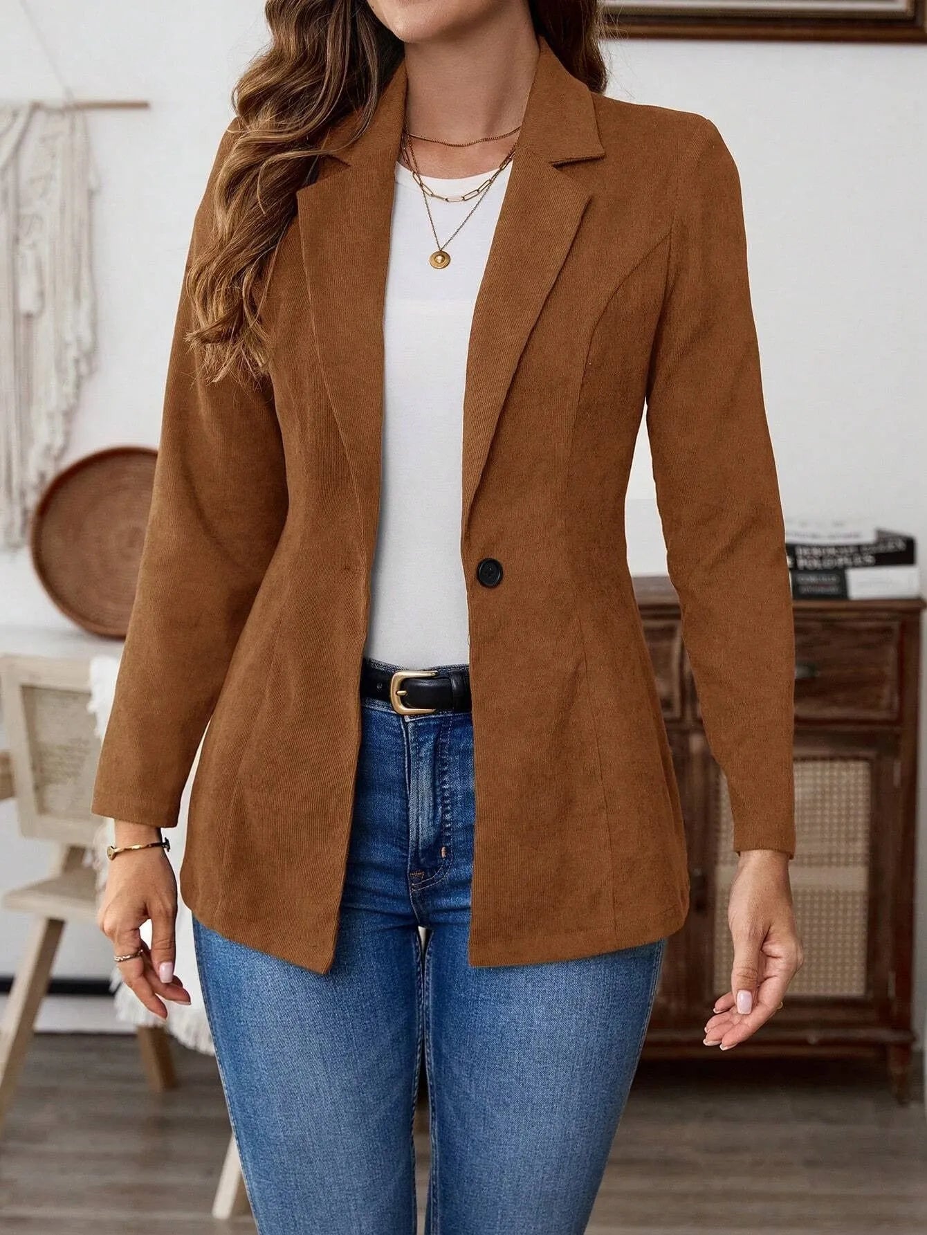 Brown men's casual suit coat with notch lapels, long sleeves, and a single-breasted button fastening.