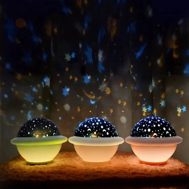 UFO-shaped plastic starry sky projection light in green colour showing rotating LED display