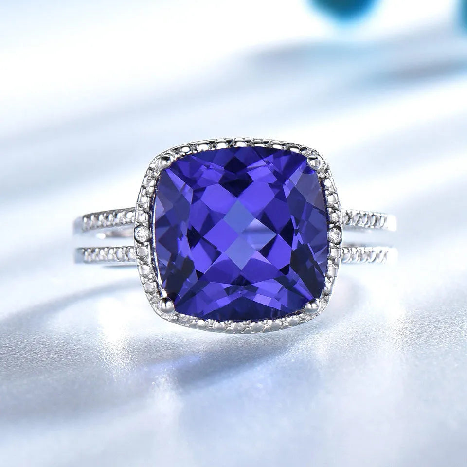 Women's sterling silver ring with blue tanzanite stone in sizes 6 to 10