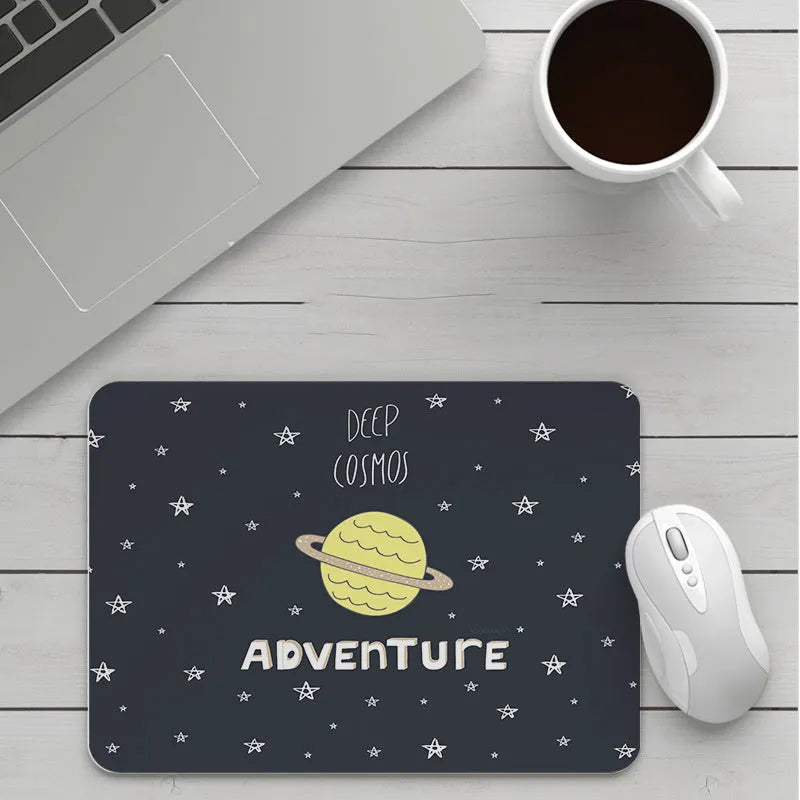 Custom cartoon mouse pad with thickening, showing example artwork on non-slip rubber and cloth base.