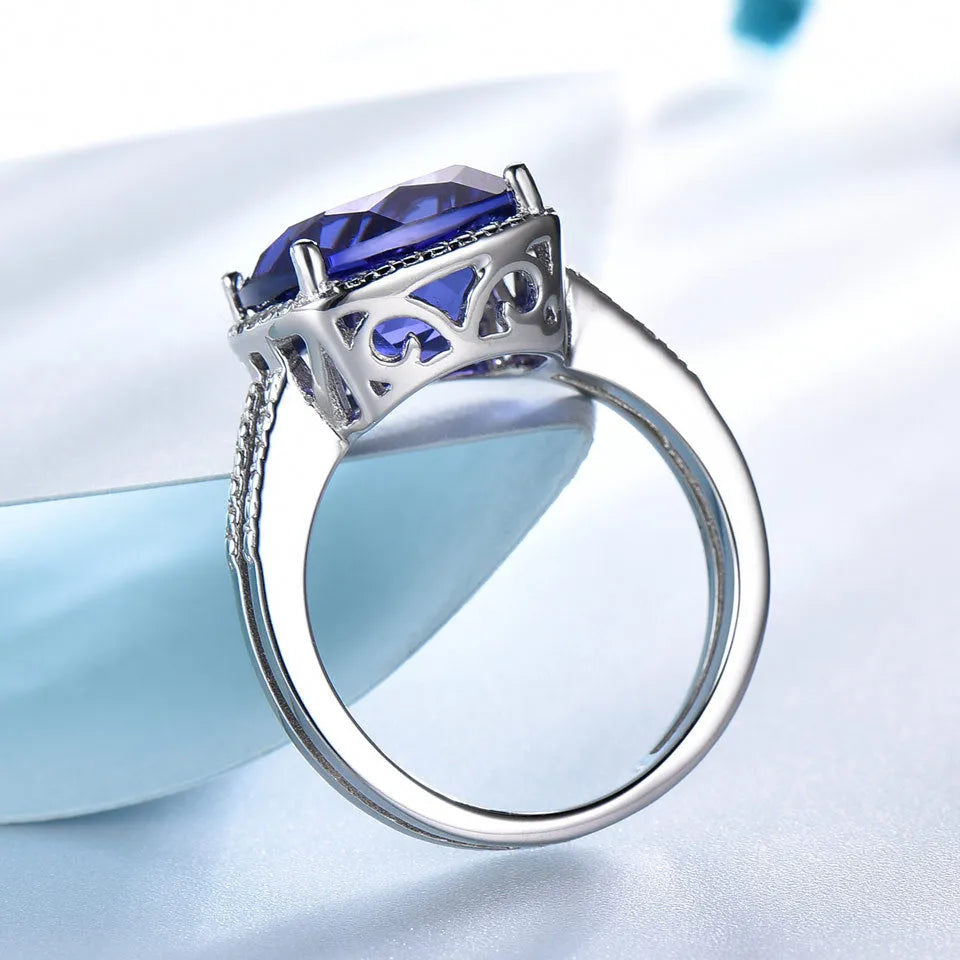 Women's sterling silver ring with blue tanzanite stone in sizes 6 to 10