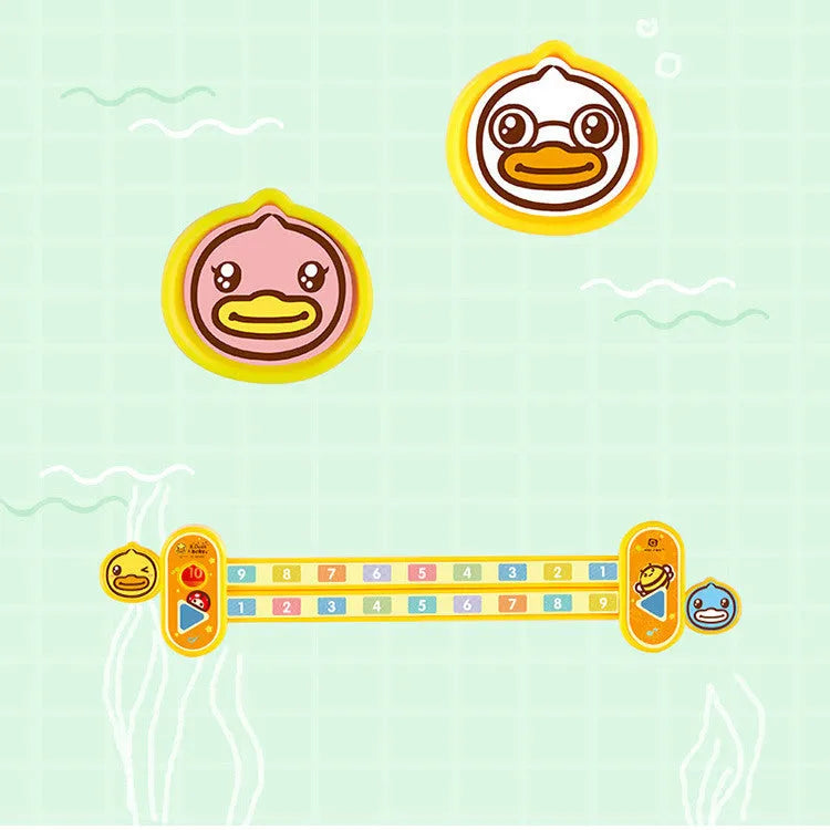 Yellow plastic children's digital resolution ruler with cartoon graphics, showing centimetre and millimetre scales.