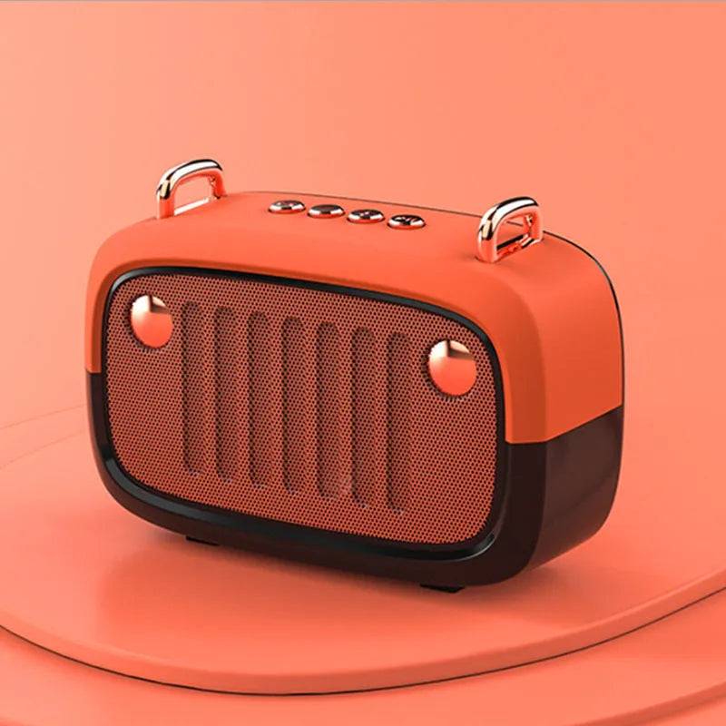 Compact portable Bluetooth mini speaker with USB port and control buttons, shown in black.