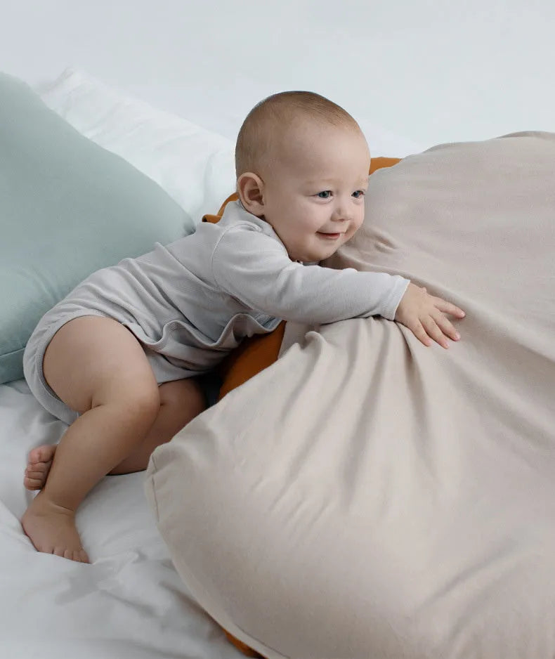 Beige portable cotton baby nest crib cushion measuring 75cm by 45cm for infant sleep.