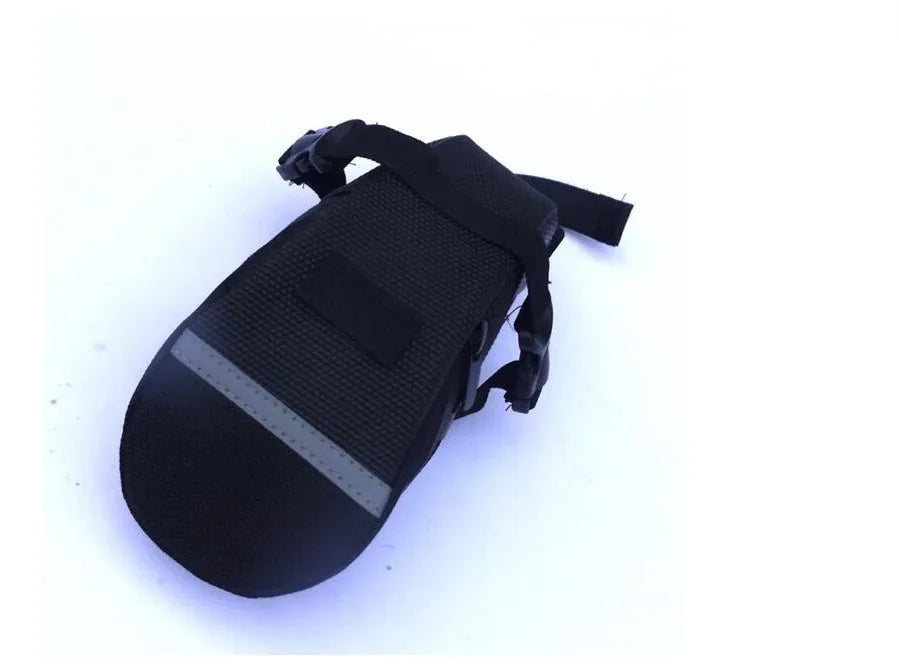 Black bicycle saddle bag made of 600D fabric with reflective strip, 20cm long, on a bike saddle