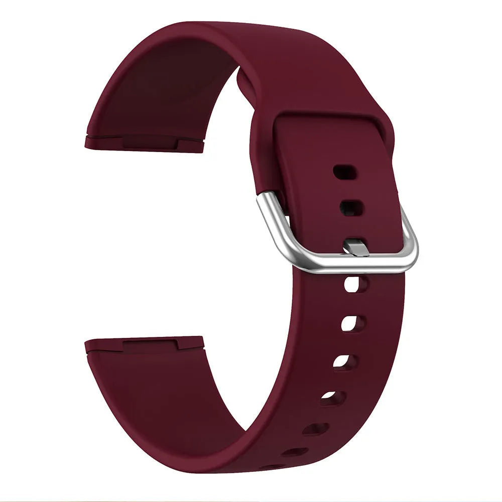Solid colour silicone replacement strap with silver buckle for Fitbit Versa 3 and Sense 2 fitness trackers.