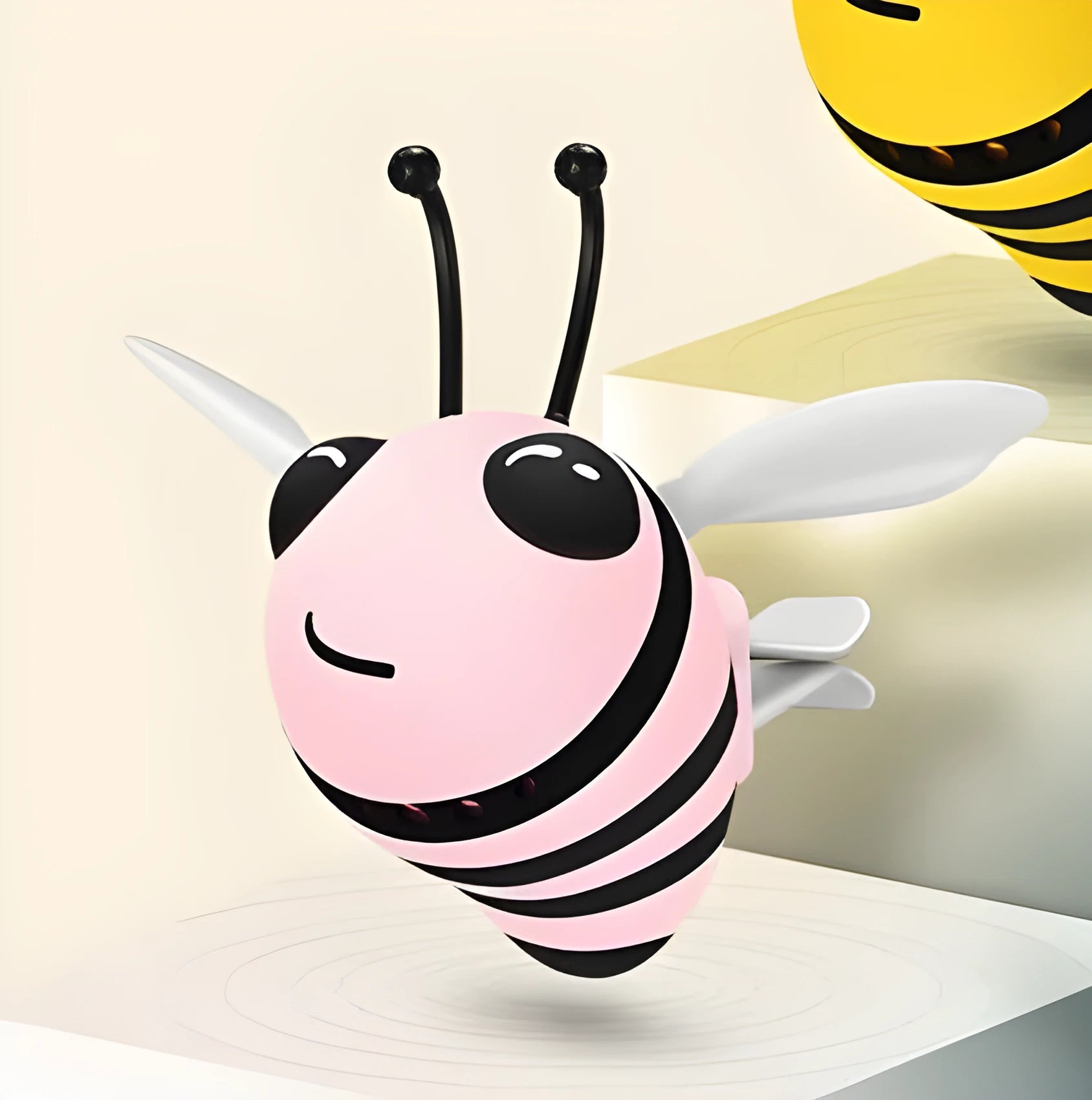 Little bee shaped car vent clip in yellow with metal alloy perfume seat and solid fragrance tablet